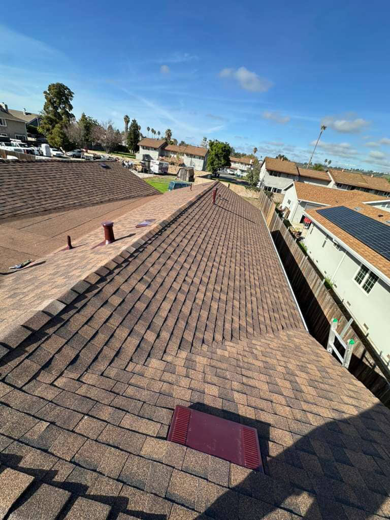 Aerial view of completed shingle roof with attic vent on Bay Area home by LAAC Roofing