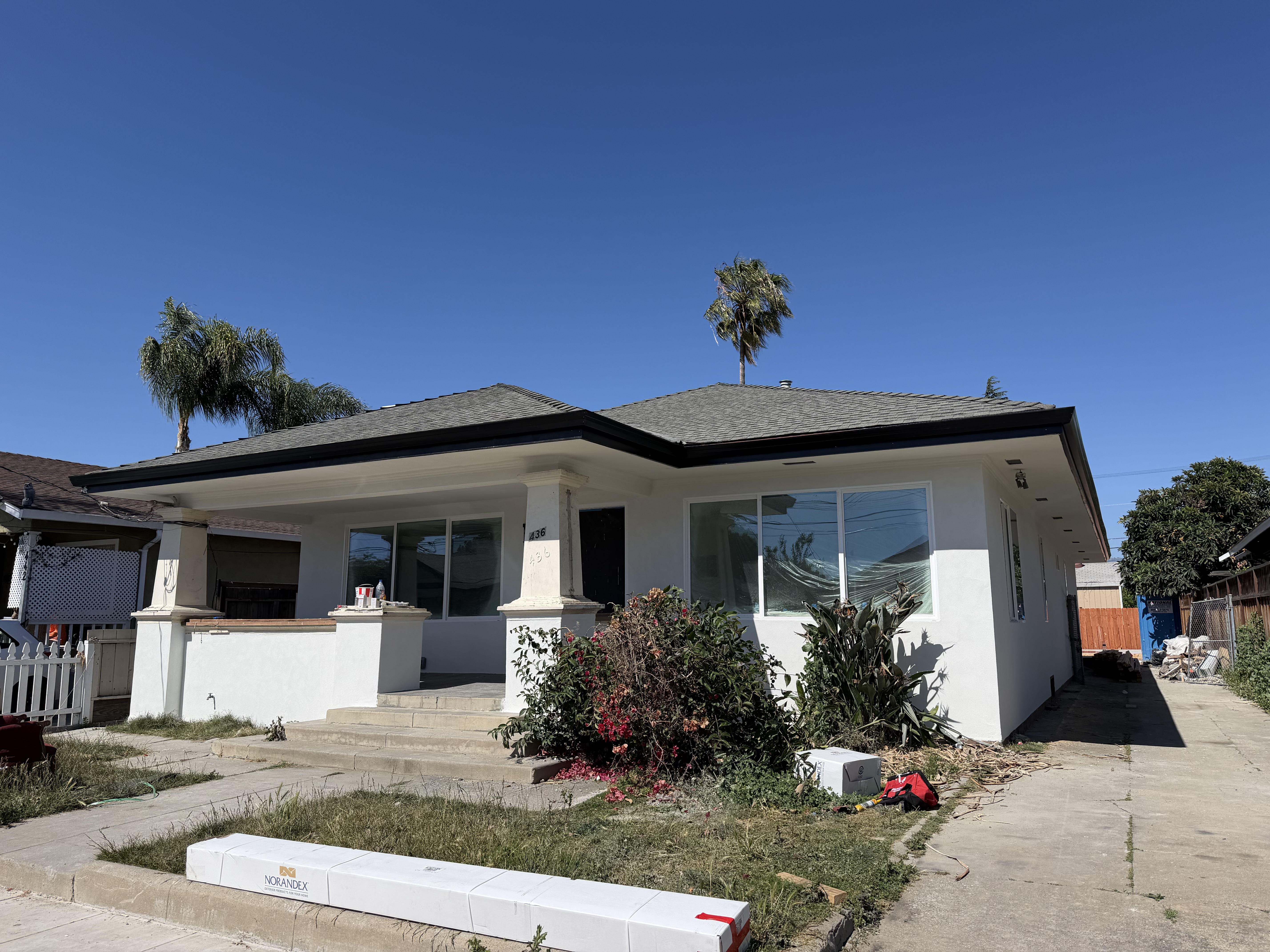 Completed re-roof on stucco home with architectural shingles Bay Area by LAAC Roofing