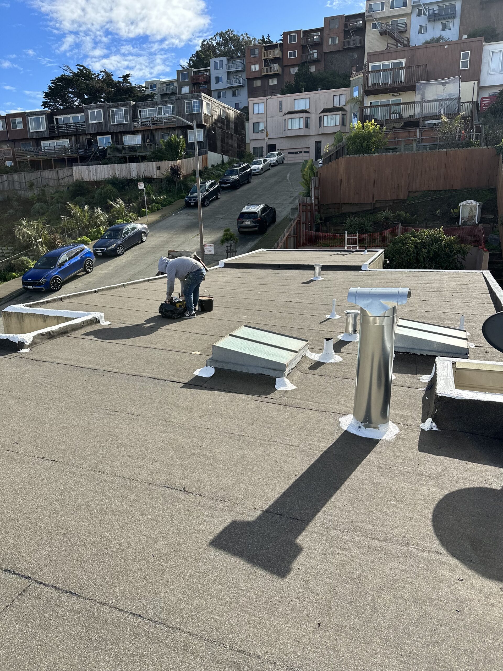 Flat roof with properly sealed pipe flashings installed by LAAC Roofing Services Bay Area